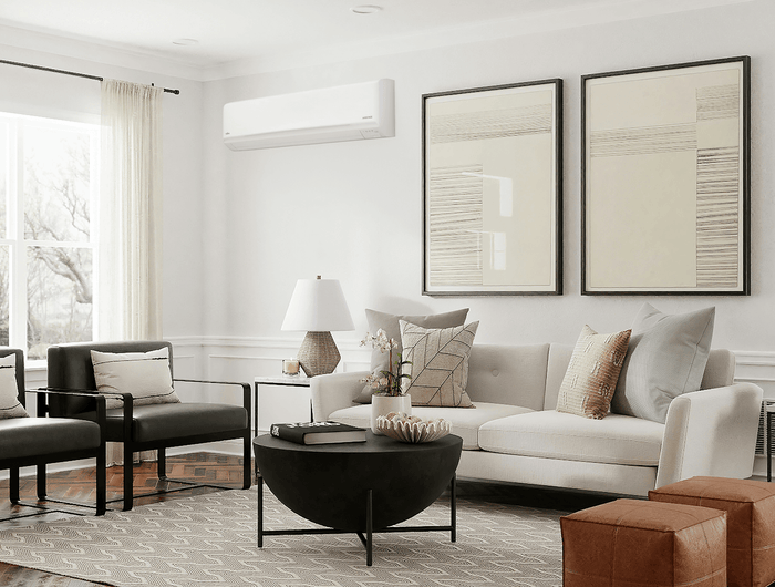 A clean and modern aesthetic lounge room with a wall-mounted air conditioner unit
