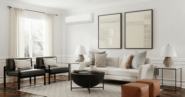 A clean and modern aesthetic lounge room with a wall-mounted air conditioner unit