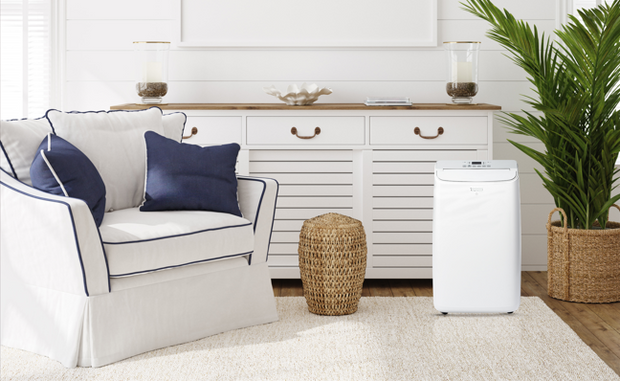 A portable air conditioner unit in a hampton styled room