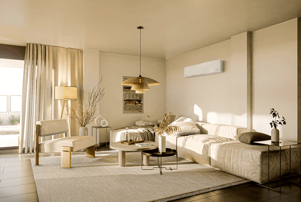 A sun-lit lounge room with a wall-mounted air conditioner unit
